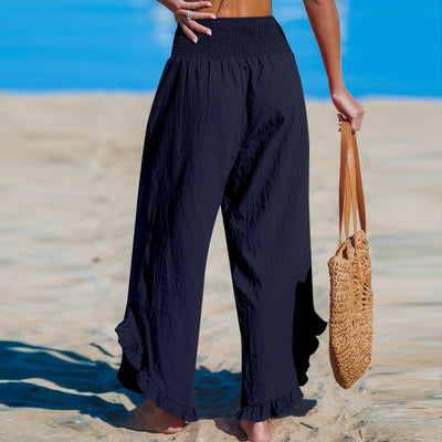 Isoldea – Smocked Ruffle Hem Trousers