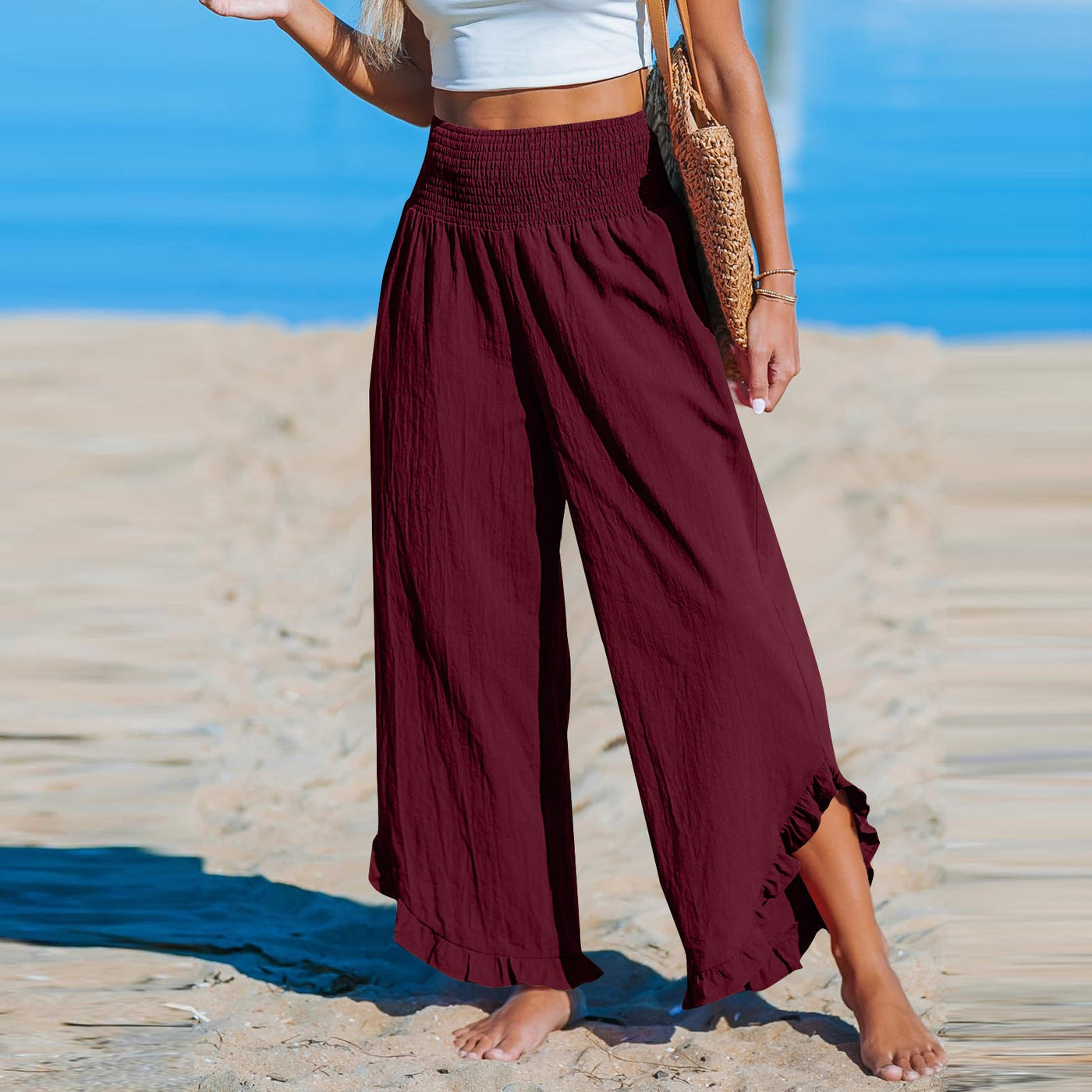 Isoldea – Smocked Ruffle Hem Trousers