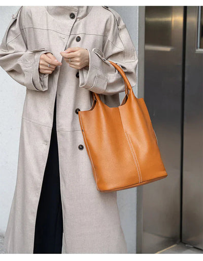 Light blue bucket bag with a luxurious leather look
