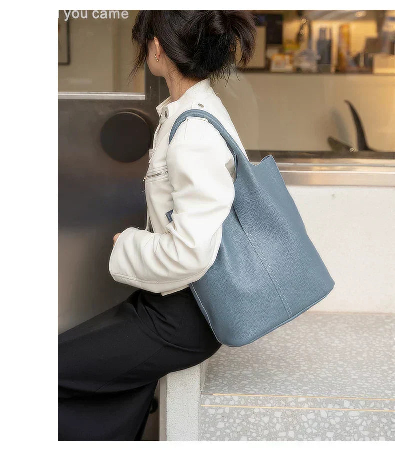 Light blue bucket bag with a luxurious leather look