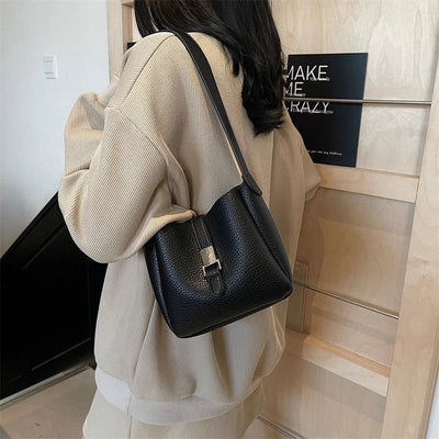 Iris™ – Modern bucket bag with a leather look