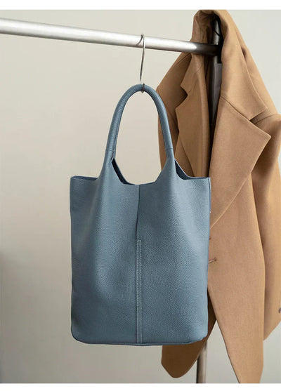 Light blue bucket bag with a luxurious leather look