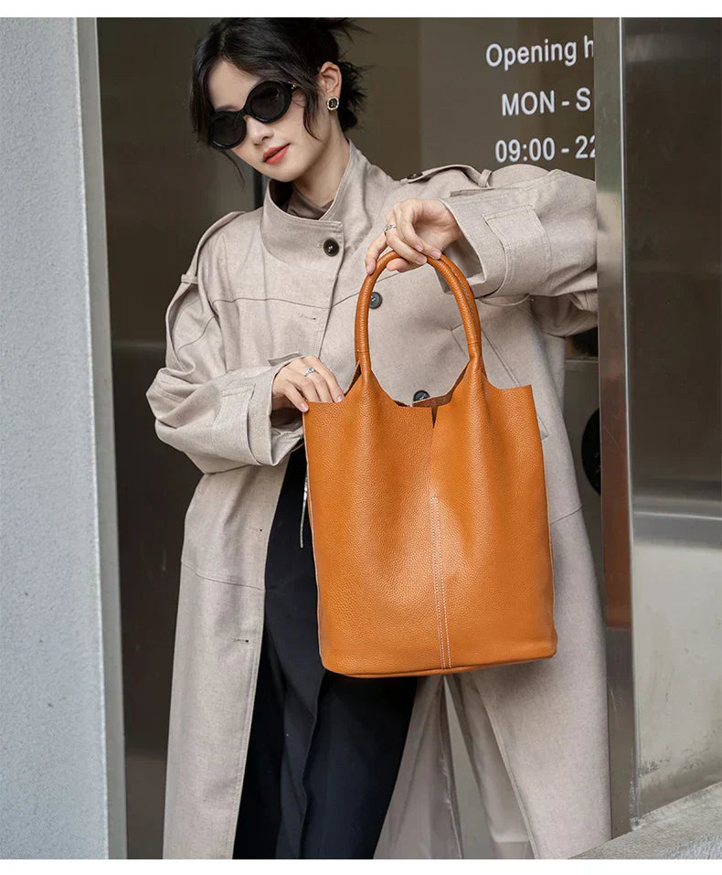 Light blue bucket bag with a luxurious leather look